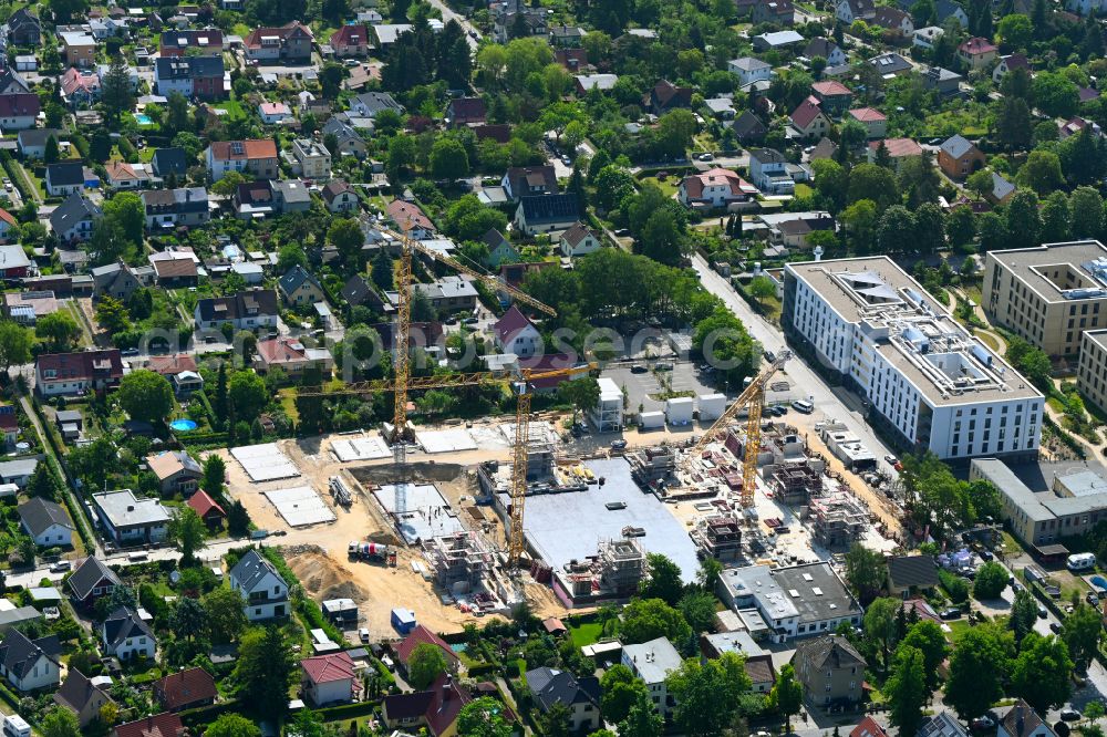 Berlin from the bird's eye view: Construction site to build a new multi-family residential complex on street Muensterberger Weg in the district Kaulsdorf in Berlin, Germany