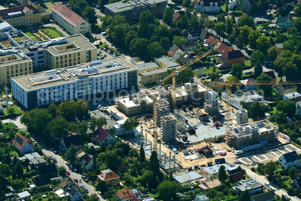Berlin from the bird's eye view: Construction site to build a new multi-family residential complex on street Muensterberger Weg in the district Kaulsdorf in Berlin, Germany