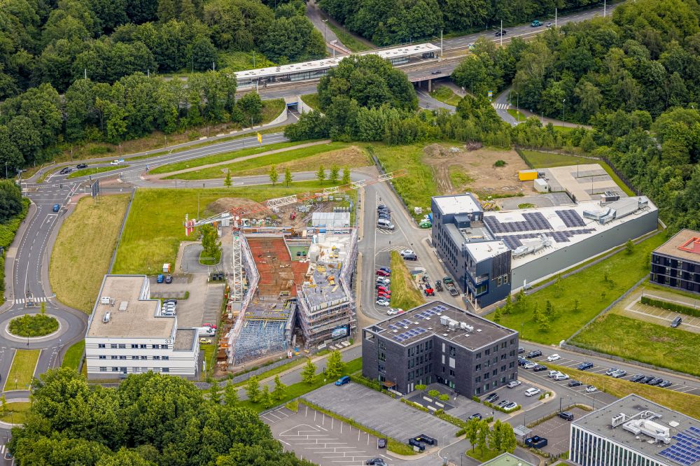 Bochum from the bird's eye view: New construction of the Innovation Center Health Management of Kampmann Hoersysteme GmbH and contec - Gesellschaft fuer Organizationsentwicklung mbH on the health campus in the district of Bochum Sued in Bochum in the Ruhr area in the state North Rhine-Westphalia, Germany