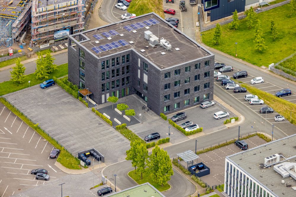 Aerial image Bochum - New construction of the Innovation Center Health Management of Kampmann Hoersysteme GmbH and contec - Gesellschaft fuer Organizationsentwicklung mbH on the health campus in the district of Bochum Sued in Bochum in the Ruhr area in the state North Rhine-Westphalia, Germany
