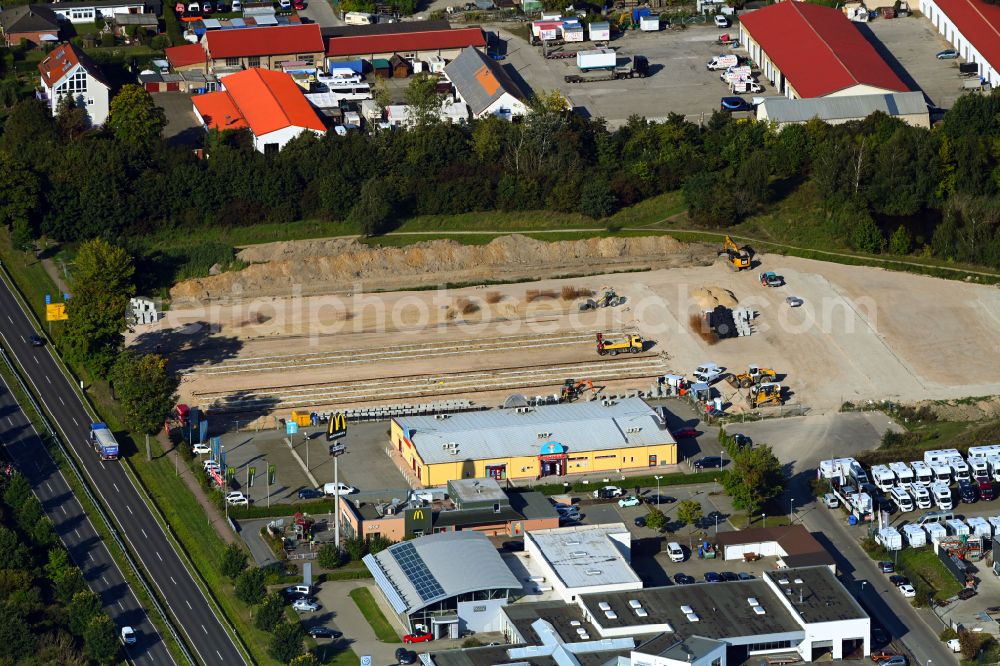 Aerial image Hönow - Construction site for the new construction of a storage house and self-storage building on Neue Mehrower Strasse - Altlandsberger Chaussee in Hoenow in the federal state of Brandenburg, Germany