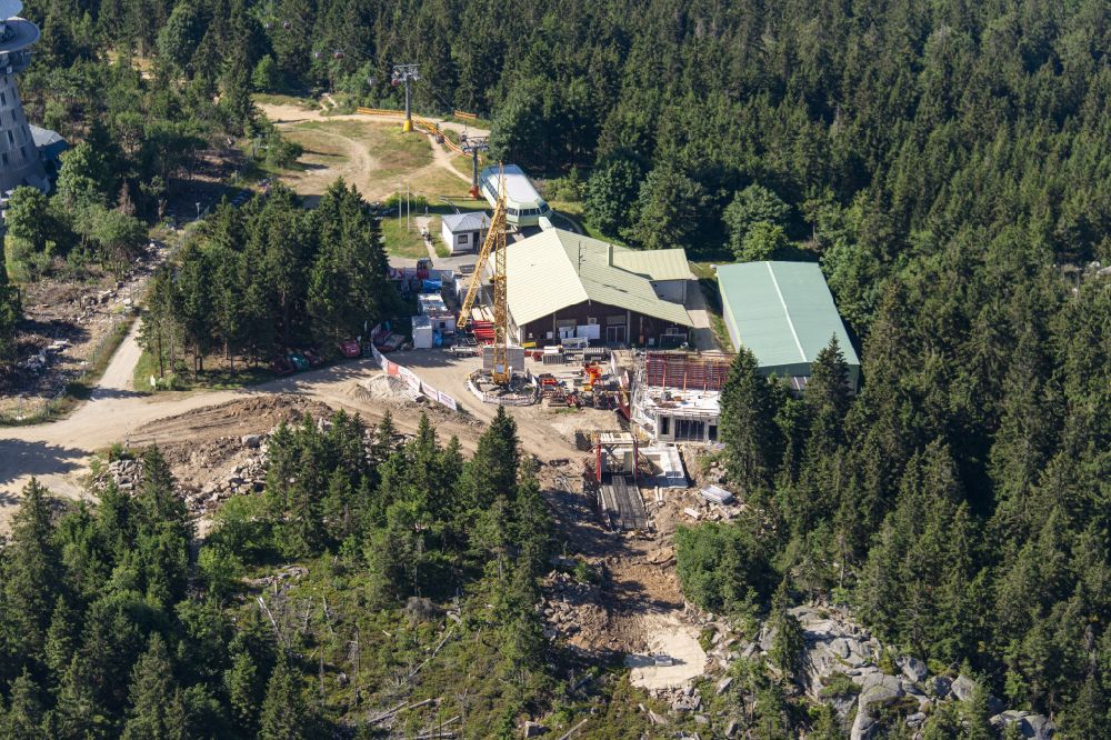 Bischofsgrün from the bird's eye view: Mountain slope with downhill ski slope and cable car - lift Ochsenkopf in Bischofsgruen in the state Bavaria, Germany