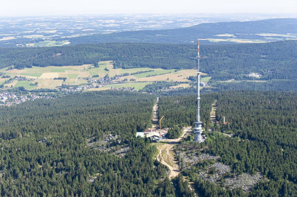 Aerial image Bischofsgrün - Mountain slope with downhill ski slope and cable car - lift Ochsenkopf in Bischofsgruen in the state Bavaria, Germany