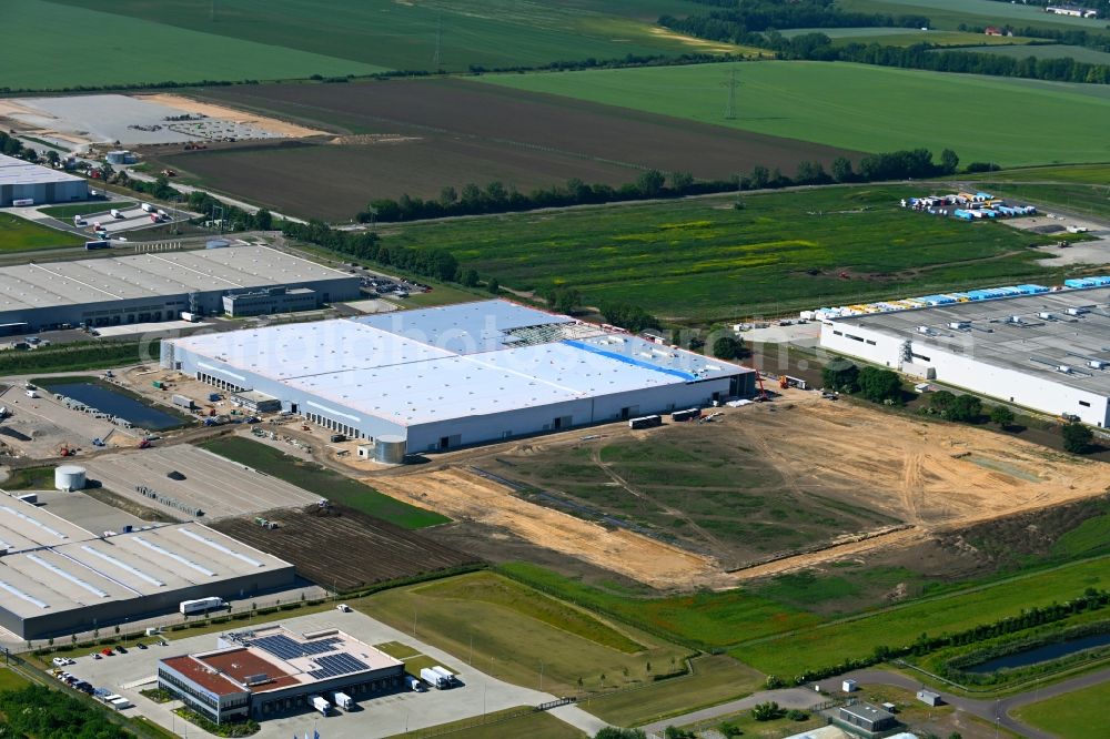 Sülzetal from the bird's eye view: Construction site to build a new building complex on the site of the logistics center Garbe Industrial Real Estate GmbH in the district Osterweddingen in Suelzetal in the state Saxony-Anhalt, Germany
