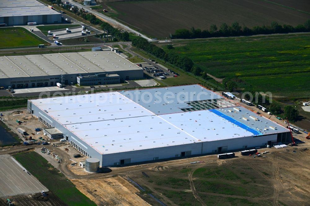 Sülzetal from the bird's eye view: Construction site to build a new building complex on the site of the logistics center Garbe Industrial Real Estate GmbH in the district Osterweddingen in Suelzetal in the state Saxony-Anhalt, Germany