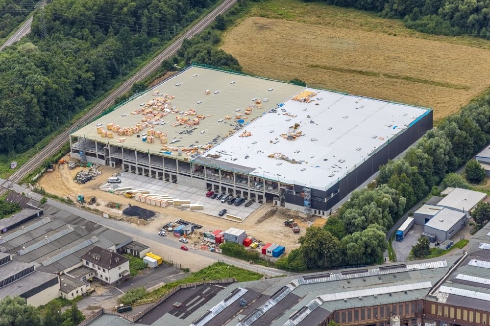 Holzwickede from the bird's eye view: Construction site to build a new building complex on the site of the logistics center of Hillwood HWE Germany GmbH in the district Hohenleuchte in Holzwickede at Ruhrgebiet in the state North Rhine-Westphalia, Germany