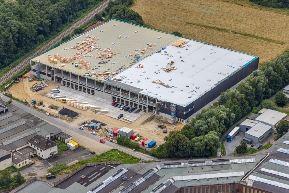 Aerial photograph Holzwickede - Construction site to build a new building complex on the site of the logistics center of Hillwood HWE Germany GmbH in the district Hohenleuchte in Holzwickede at Ruhrgebiet in the state North Rhine-Westphalia, Germany