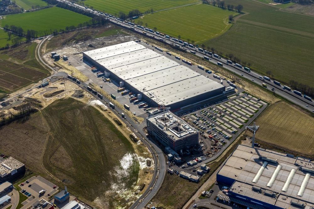 Aerial image Kamen - New construction of a building complex on the premises of the logistics center of Woolworth GmbH in the inter-communal commercial area on the Kamen Karree in Kamen in the state North Rhine-Westphalia, Germany