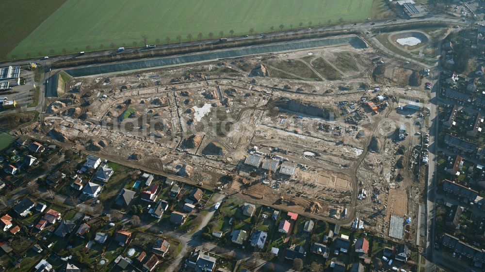 Ahrensfelde from the bird's eye view: Construction site to build a new multi-family residential complex Ahrensfelder Obstwiesen on street Blumberger Chaussee in Ahrensfelde in the state Brandenburg, Germany