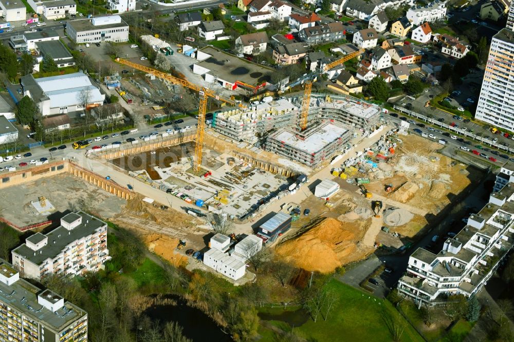 Nieder-Eschbach from the bird's eye view: Construction site for the construction of an apartment building and student residence on the Ben-Gurion-Ring in Nieder-Eschbach in the state of Hesse, Germany