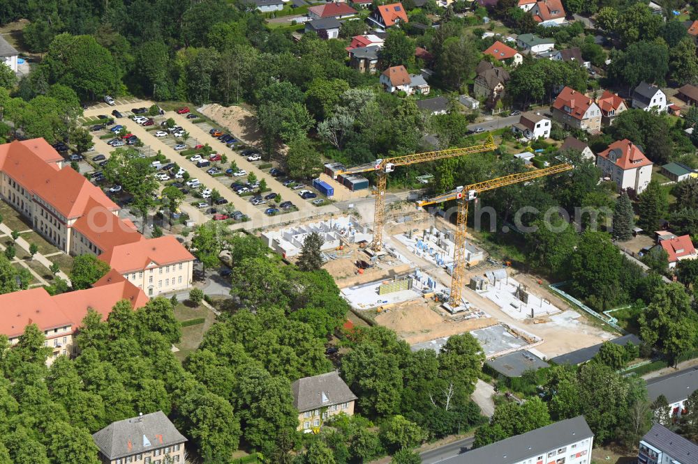 Aerial image Berlin - Construction site to build a new multi-family residential complex on street Poelnitzweg in the district Buch in Berlin, Germany