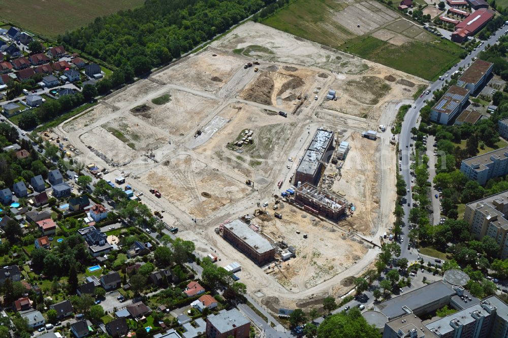 Aerial image Berlin - Construction site to build a new multi-family residential complex Buckower Felder on street Gerlinger Strasse in the district Buckow in Berlin, Germany