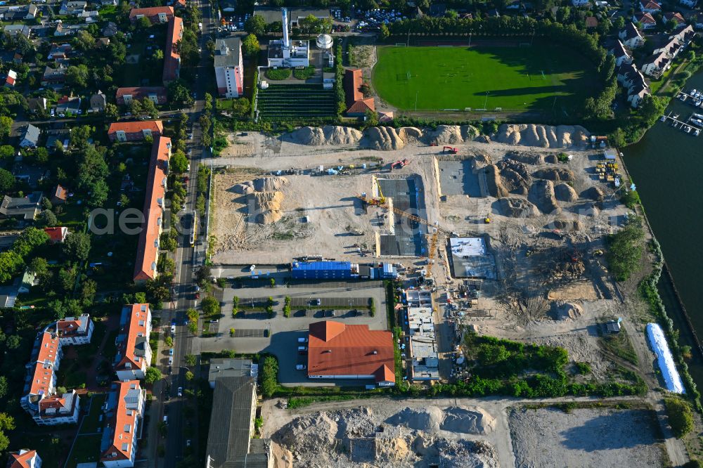 Berlin from the bird's eye view: Construction site to build a new multi-family residential complex on street Wendenschlossstrasse in the district Koepenick in Berlin, Germany