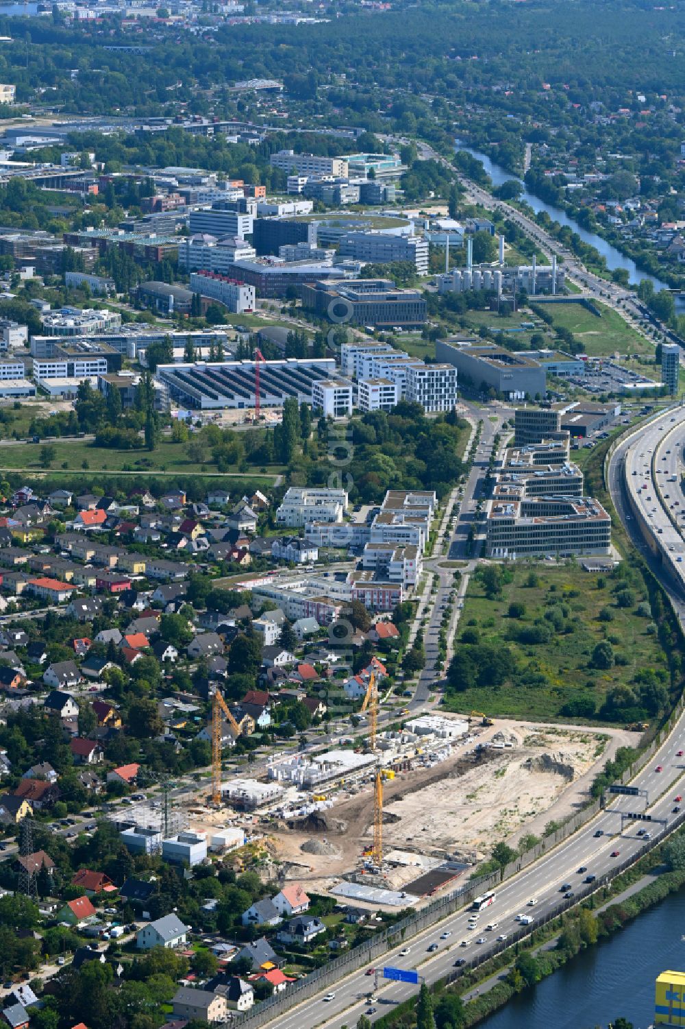 Berlin from above - Construction site to build a new multi-family residential complex on Eisenhutweg in the district Johannisthal in Berlin, Germany
