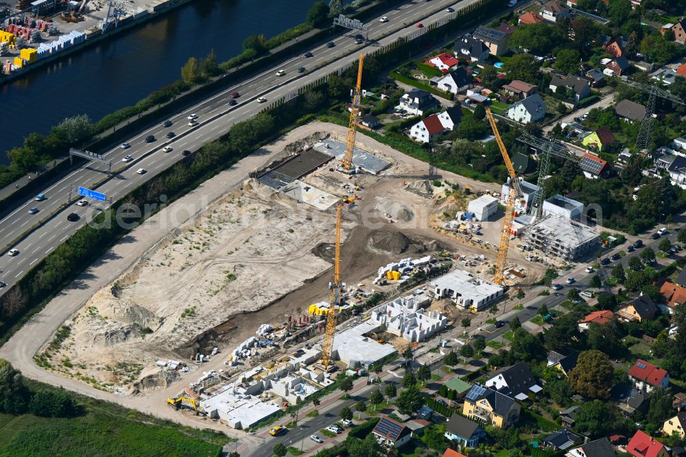 Berlin from above - Construction site to build a new multi-family residential complex on Eisenhutweg in the district Johannisthal in Berlin, Germany