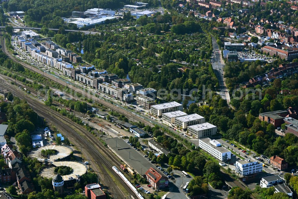 Lüneburg from the bird's eye view: Construction site to build a new multi-family residential complex Ilmenau Garten in Lueneburg in the state Lower Saxony, Germany