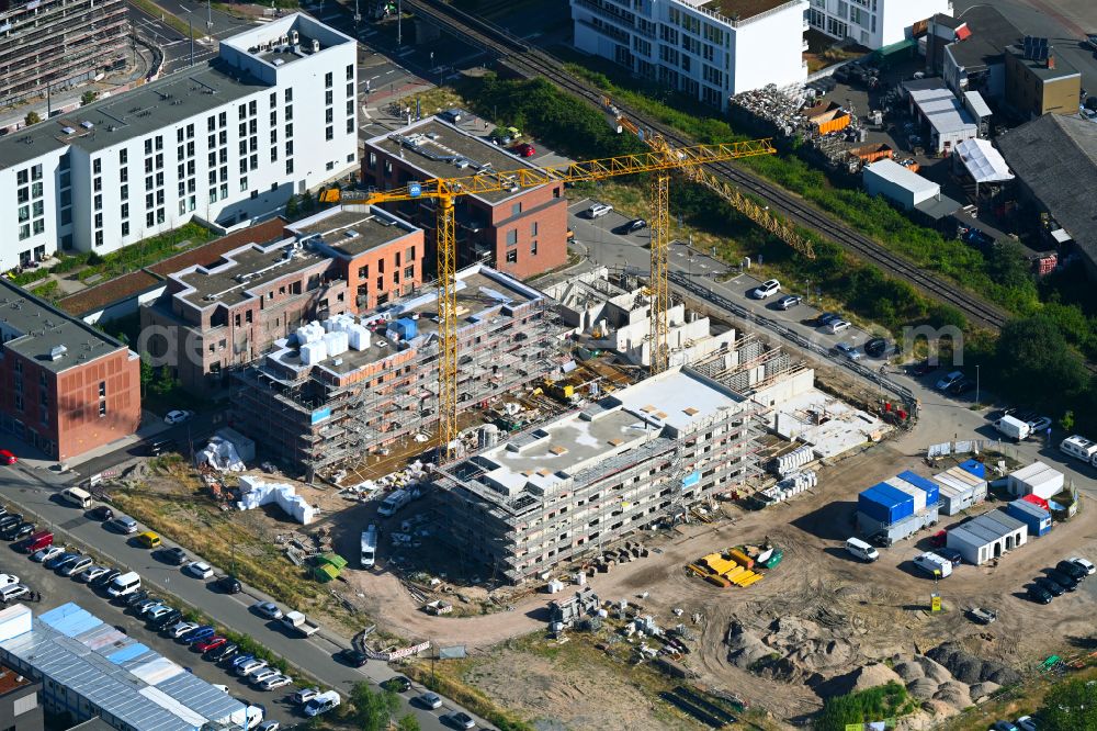 Aerial photograph Bremen - Construction site to build a new multi-family residential complex in Kaffequartier on street Grete-Henry-Strasse in the district Ueberseestadt in Bremen, Germany