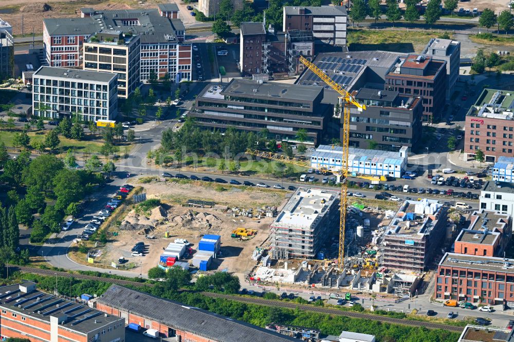 Aerial image Bremen - Construction site to build a new multi-family residential complex in Kaffequartier on street Grete-Henry-Strasse in the district Ueberseestadt in Bremen, Germany