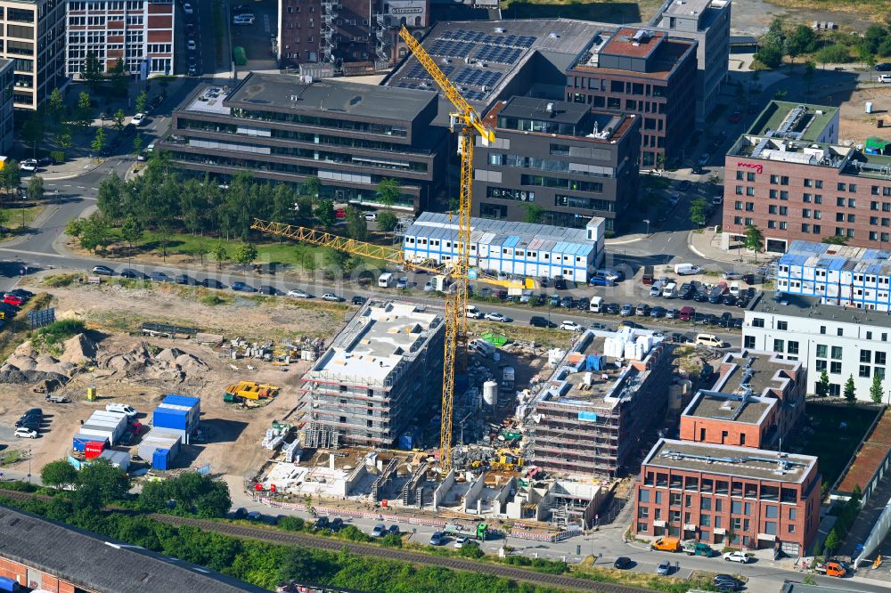 Aerial photograph Bremen - Construction site to build a new multi-family residential complex in Kaffequartier on street Grete-Henry-Strasse in the district Ueberseestadt in Bremen, Germany