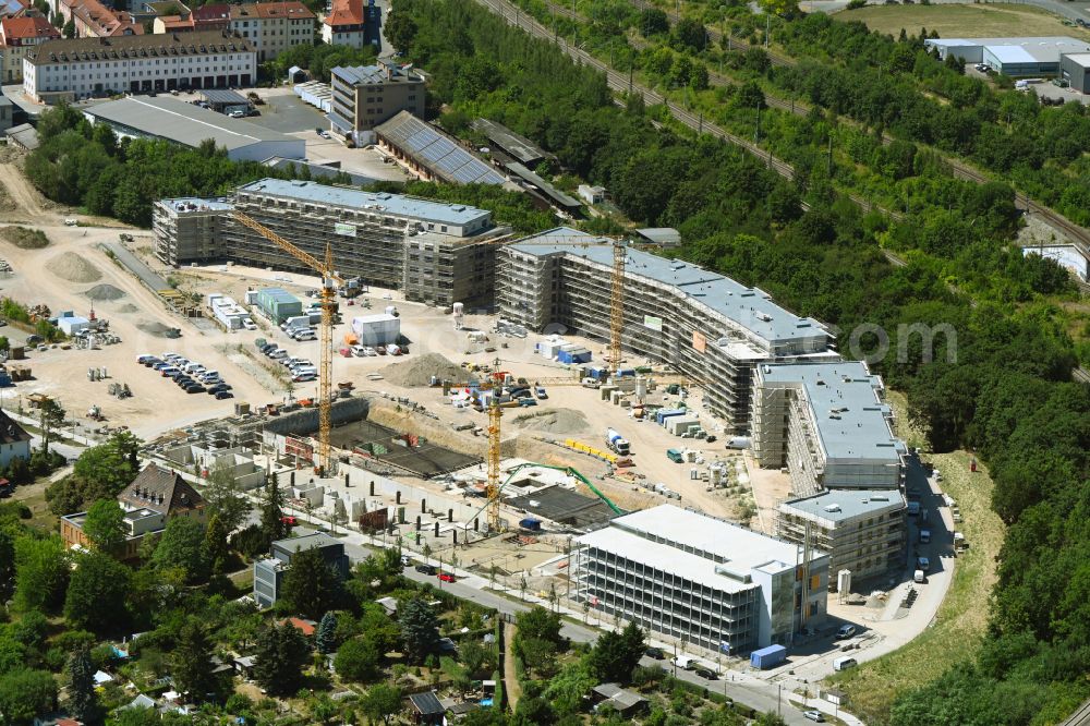 Weimar from the bird's eye view: Construction site to build a new multi-family residential complex Kirschberg Quartier on street Eduard-Rosenthal-Strasse in Weimar in the state Thuringia, Germany
