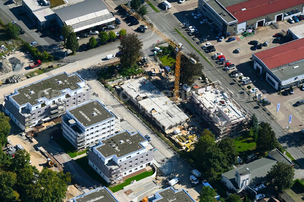 Jena from the bird's eye view: Construction site to build a new multi-family residential complex Linden-Allee on street Joachim-Darjes-Strasse in the district Zwaetzen in Jena in the state Thuringia, Germany