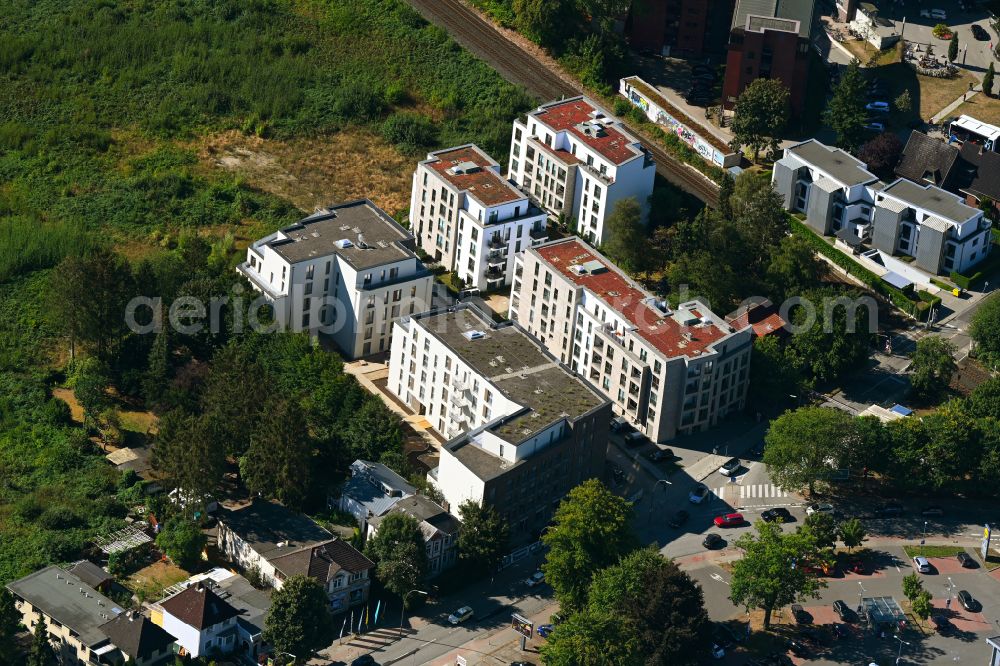 Aerial photograph Hamburg - Construction site to build a new multi-family residential complex on street Pinneberger Strasse in the district Schnelsen in Hamburg, Germany
