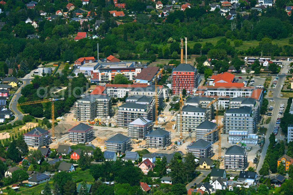 Aerial image Falkensee - Construction site to build a new multi-family residential complex Schwarzbrunner Strasse - Rotkehlchenstrasse on street Falkenstrasse in Falkensee in the state Brandenburg, Germany
