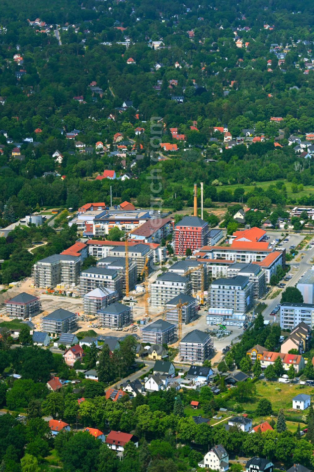 Aerial photograph Falkensee - Construction site to build a new multi-family residential complex Schwarzbrunner Strasse - Rotkehlchenstrasse on street Falkenstrasse in Falkensee in the state Brandenburg, Germany
