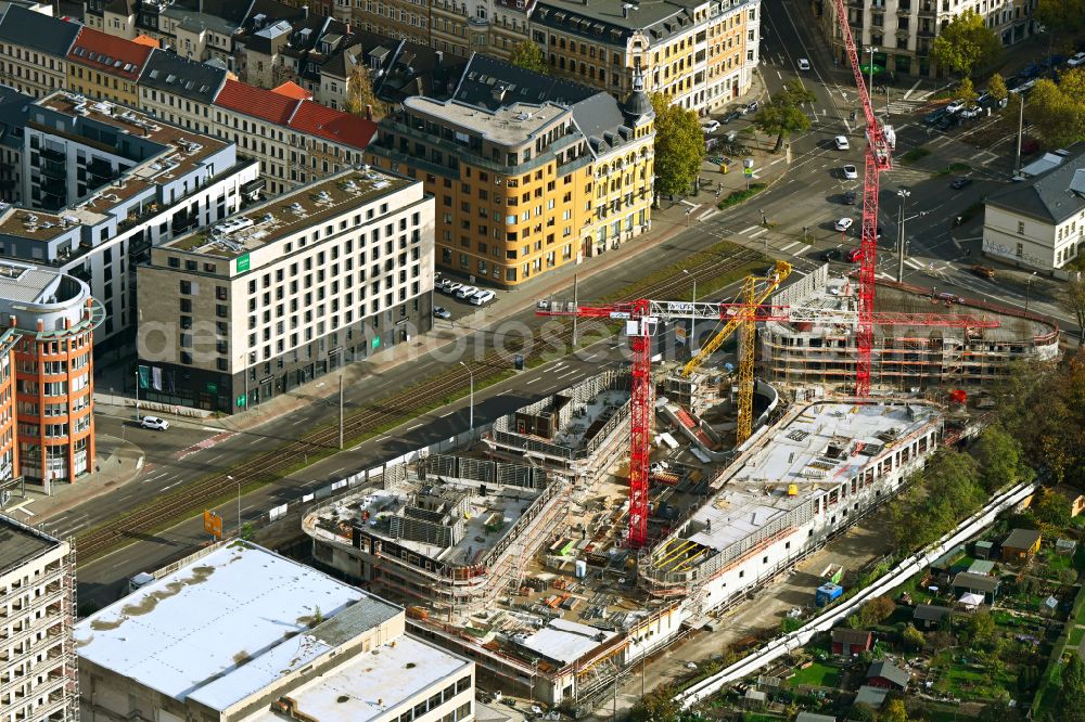Leipzig from the bird's eye view: Construction site to build a new multi-family residential complex on Prager Strasse corner Johannisallee in the district Zentrum-Suedost in Leipzig in the state Saxony, Germany