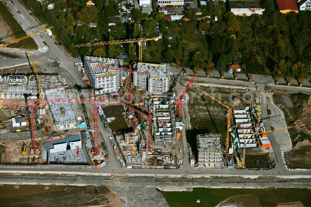 Mannheim from the bird's eye view: Construction site to build a new multi-family residential complex Quartiere Bumerang - Wohnen am Park - FLAIRWOOD und Spinelli 10.5 on street Anna-Sammet-Strasse in the district Kaefertal in Mannheim in the state Baden-Wuerttemberg, Germany