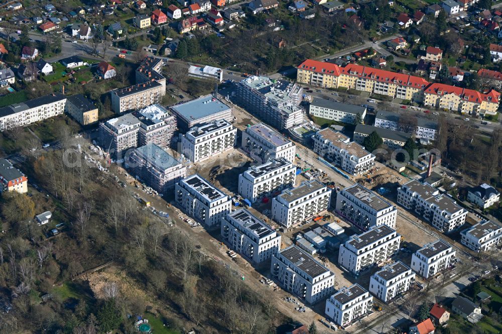 Berlin from the bird's eye view: Construction site to build a new multi-family residential complex Quartier Iduna on Romain-Rolland-Strasse - Idunastrasse - Neukirchstrasse in the district Heinersdorf in Berlin, Germany