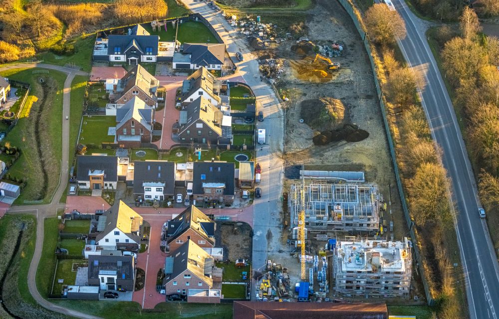 Aerial image Kirchhellen - Construction site to build a new multi-family residential complex on Rentforter Strasse - Schultenkamp in Kirchhellen at Ruhrgebiet in the state North Rhine-Westphalia, Germany