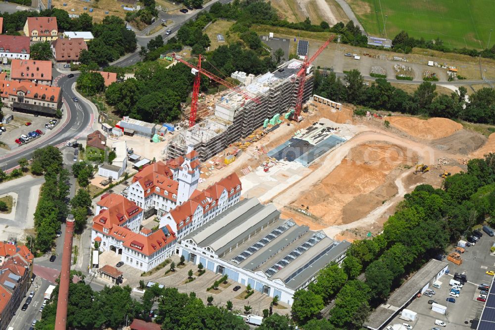 Nürnberg from above - Construction site to build a new multi-family residential complex with condominiumson Tramliving Adolf-Braun-Strasse in the district Muggenhof in Nuremberg in the state Bavaria, Germany