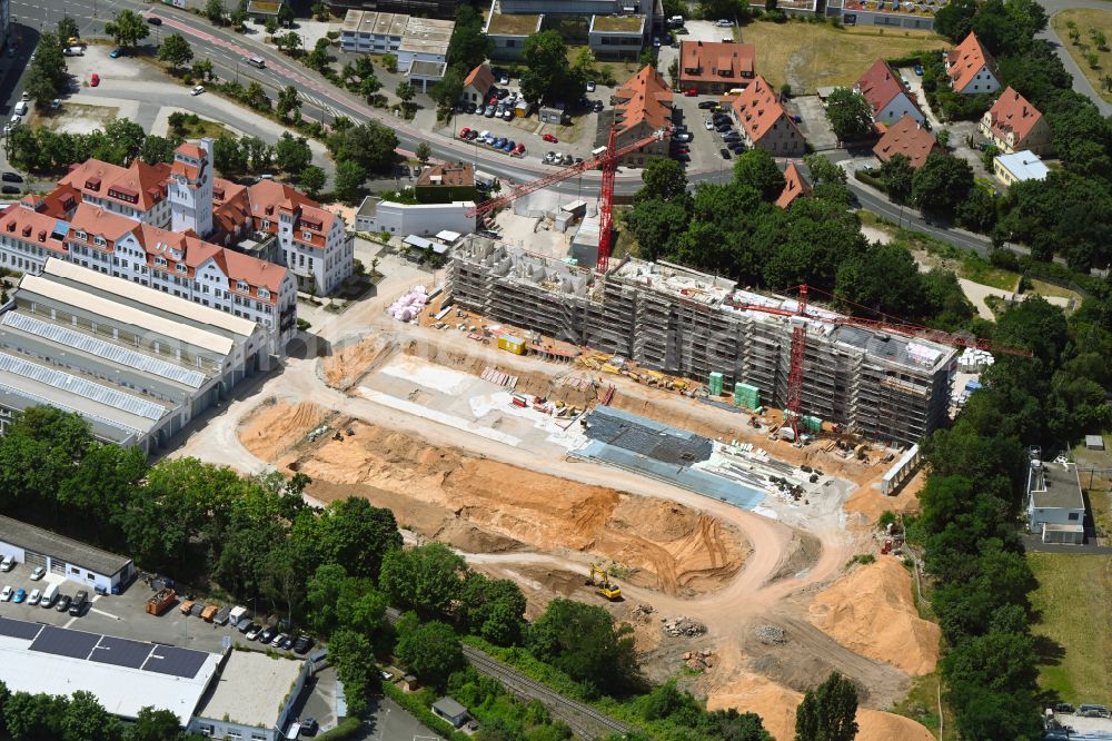 Aerial image Nürnberg - Construction site to build a new multi-family residential complex with condominiumson Tramliving Adolf-Braun-Strasse in the district Muggenhof in Nuremberg in the state Bavaria, Germany