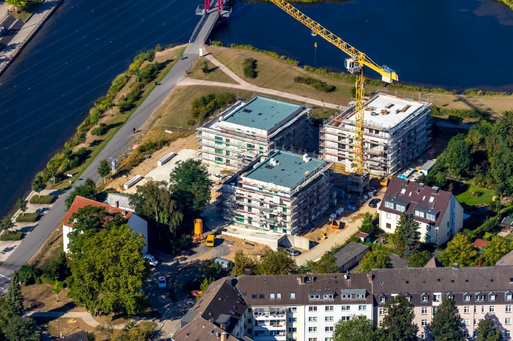 Aerial image Essen - Construction site for the construction of an apartment building Uferviertel Nord on Lake Niederfeld in the district of Altendorf in Essen in the state of North Rhine-Westphalia, Germany