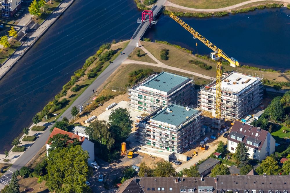 Essen from the bird's eye view: Construction site for the construction of an apartment building Uferviertel Nord on Lake Niederfeld in the district of Altendorf in Essen in the state of North Rhine-Westphalia, Germany