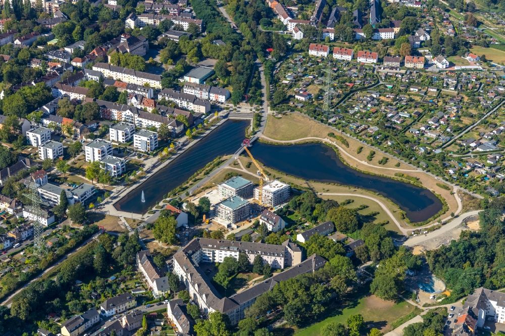Aerial image Essen - Construction site for the construction of an apartment building Uferviertel Nord on Lake Niederfeld in the district of Altendorf in Essen in the state of North Rhine-Westphalia, Germany