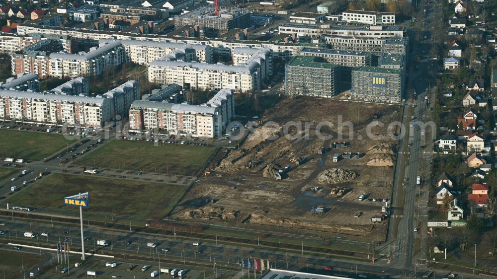 Berlin from the bird's eye view: Construction site to build a new multi-family residential complex Weisse Taube between Ferdinand-Schultze-Strasse, Plauener Strasse and Landsberger Allee in the district Hohenschoenhausen in Berlin, Germany
