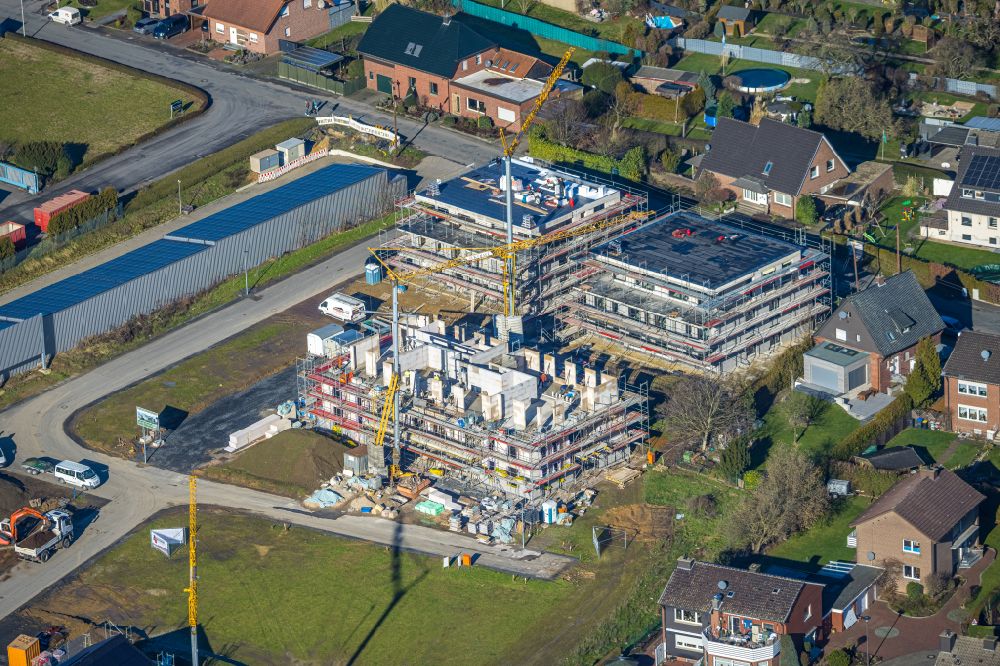 Werne from the bird's eye view: Construction site to build a new multi-family residential complex Wohnquartier Baaken between the streets Baaken und Bellingheide in Werne at Ruhrgebiet in the state North Rhine-Westphalia, Germany
