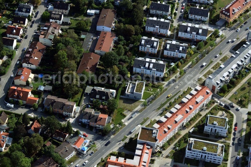 München, Trudering-Riem from above - Construction of a neighborhood meeting and self-help organization at the Bajuwarenstrasse in Munich in Bavaria. Designed by zillerplus architects and urban planners enstand a modern multi - purpose building with the goal of civic engagement in the Quartier activate