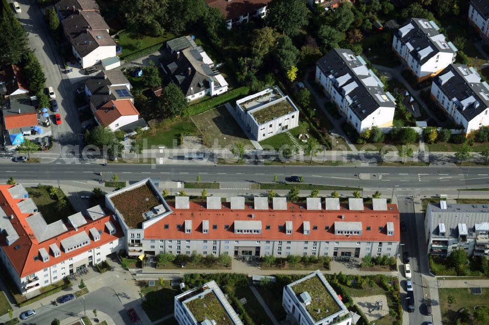 Aerial photograph München, Trudering-Riem - Construction of a neighborhood meeting and self-help organization at the Bajuwarenstrasse in Munich in Bavaria. Designed by zillerplus architects and urban planners enstand a modern multi - purpose building with the goal of civic engagement in the Quartier activate