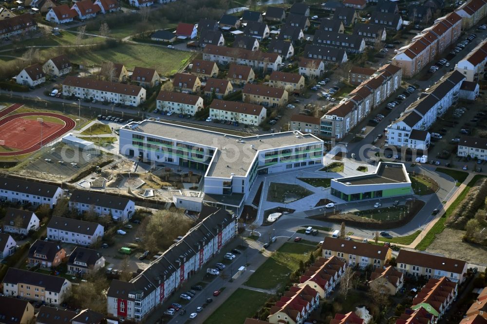 Hönow from the bird's eye view: Construction site for the new building city destrict center between of Schulstrasse and of Marderstrasse in Hoenow in the state Brandenburg, Germany