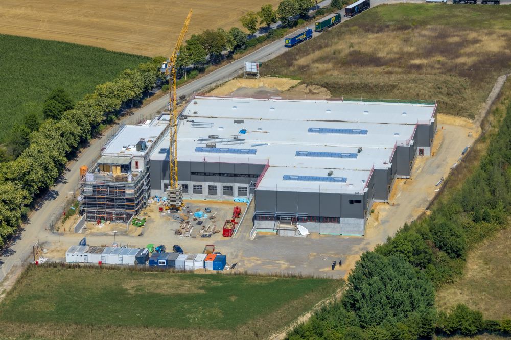 Heiligenhaus from the bird's eye view: Construction site for a new office and commercial building for the company R+M de Wit GmbH in Heiligenhaus in the Ruhr area in the state of North Rhine-Westphalia, Germany