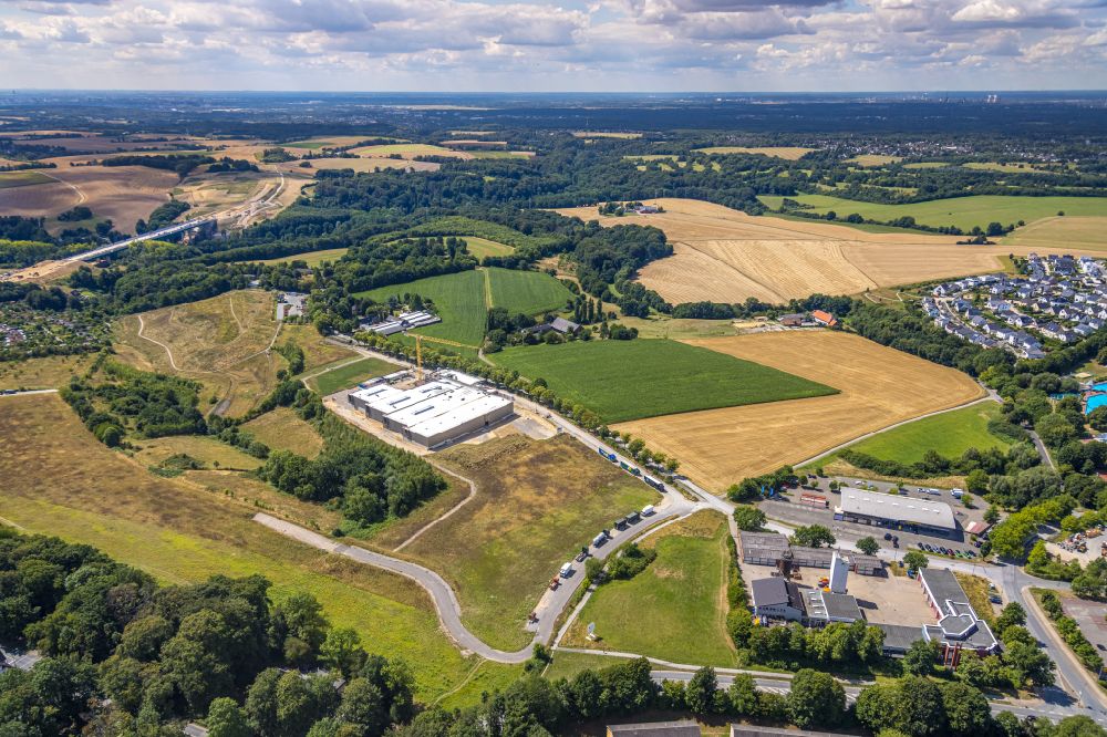 Aerial photograph Heiligenhaus - Construction site for a new office and commercial building for the company R+M de Wit GmbH in Heiligenhaus in the Ruhr area in the state of North Rhine-Westphalia, Germany