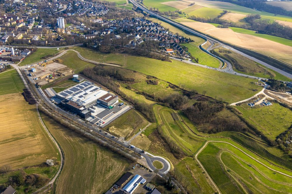 Aerial image Heiligenhaus - Construction site for a new office and commercial building for the company R+M de Wit GmbH on street Bertha-Benz-Allee in Heiligenhaus in the Ruhr area in the state of North Rhine-Westphalia, Germany