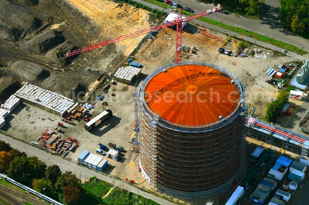 Berlin from the bird's eye view: Construction site for the new construction of a retention basin and water storage tank - heat storage tank on the premises of the Reuter West combined heat and power plant in the district of Siemensstadt in the district Siemensstadt in Berlin, Germany