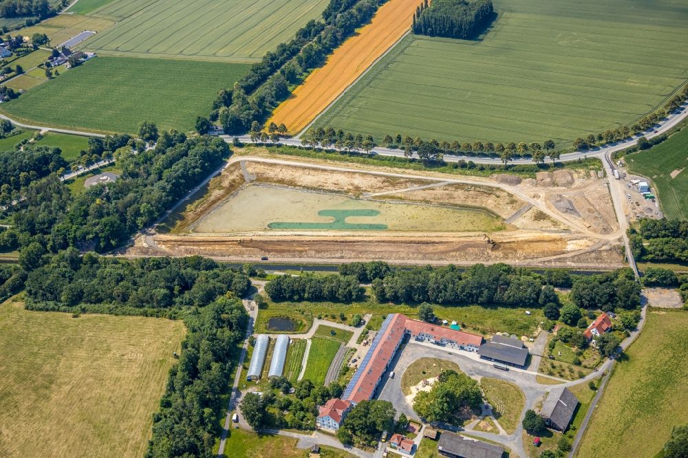 Dortmund from the bird's eye view: Construction site for the new construction of the retention basin and water storage in the district Niedernette in Dortmund in the state North Rhine-Westphalia, Germany