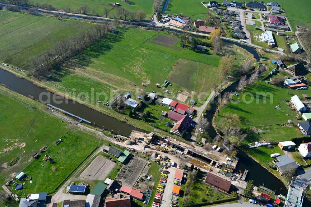 Banzkow from above - Construction site for the new construction and expansion of the lock systems and replacement construction of the weir system on the banks of the Stoerkanal waterway in Banzkow in the state Mecklenburg-West Pomerania, Germany