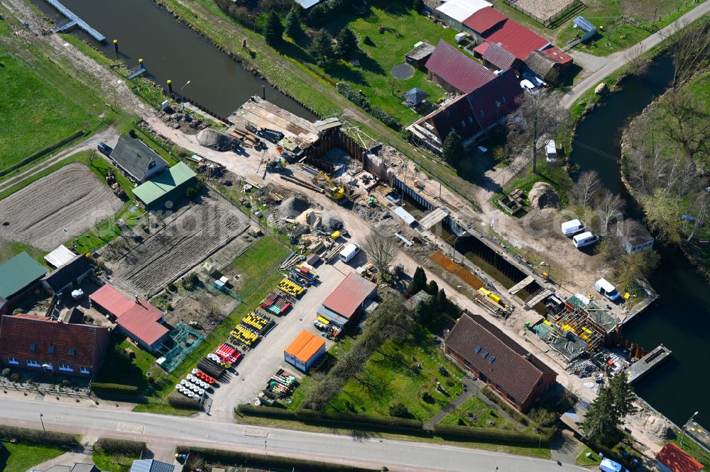 Banzkow from the bird's eye view: Construction site for the new construction and expansion of the lock systems and replacement construction of the weir system on the banks of the Stoerkanal waterway in Banzkow in the state Mecklenburg-West Pomerania, Germany