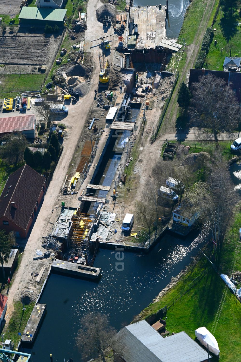 Banzkow from the bird's eye view: Construction site for the new construction and expansion of the lock systems and replacement construction of the weir system on the banks of the Stoerkanal waterway in Banzkow in the state Mecklenburg-West Pomerania, Germany